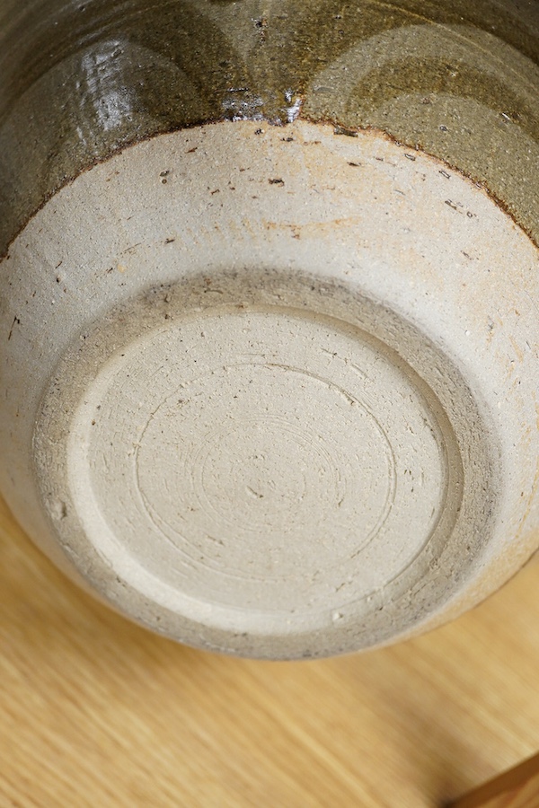 Three studio pottery bowls, one signed ‘A’ to the base, largest 34cm in diameter. Condition - good